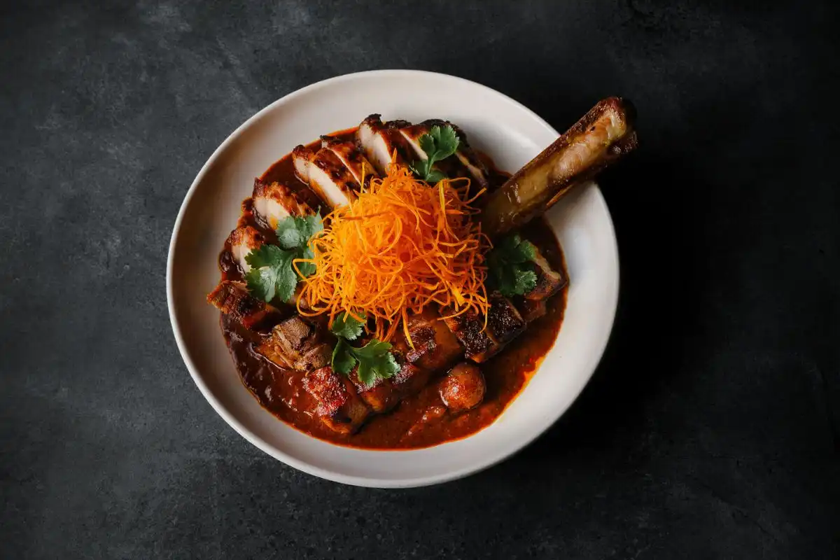 Mama San's Grilled Pork Tomahawk Massaman Curry